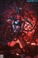 A woman in a black and red outfit is sitting on a pile of wires.